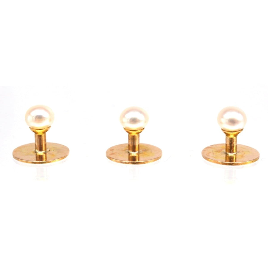 Set of Edwardian 9ct gold dress studs featuring natural pearls, retailed by Goldsmiths & Silversmiths Company.