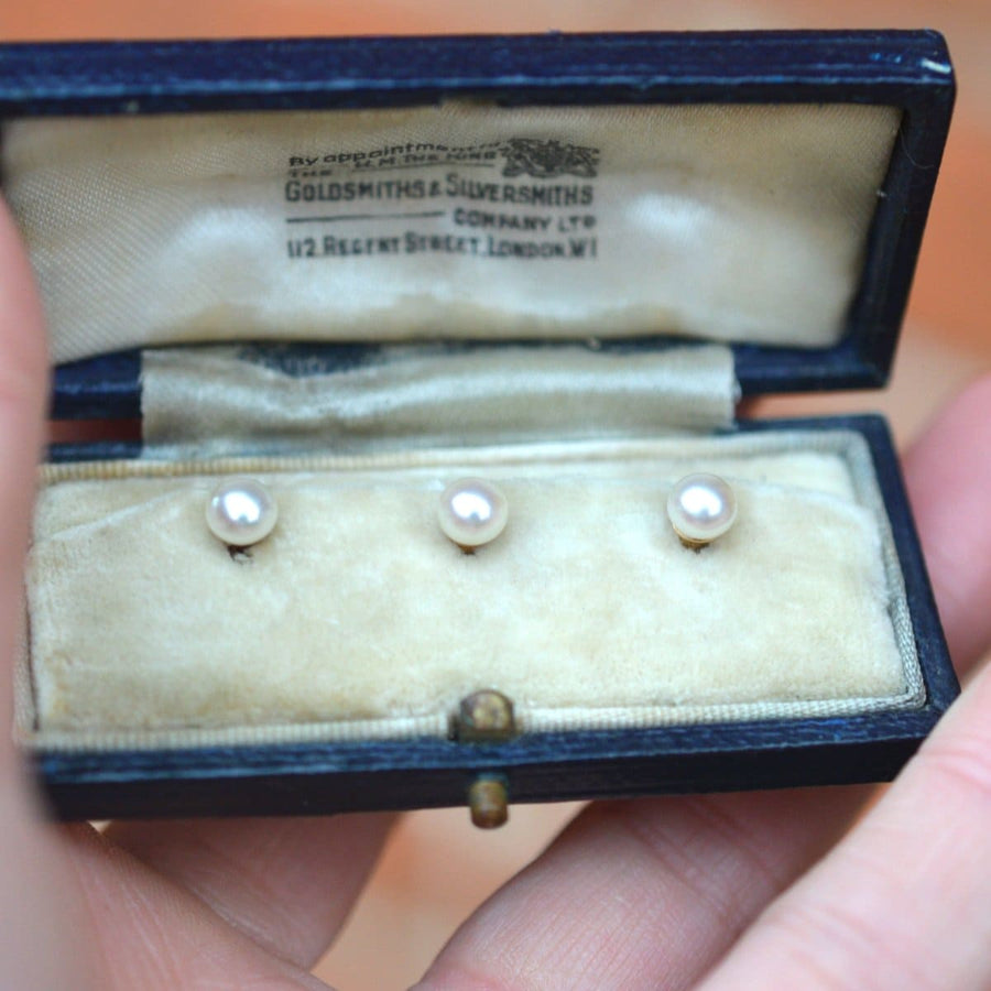 Set of Edwardian 9ct gold natural pearl dress studs in original Goldsmiths & Silversmiths Company box.