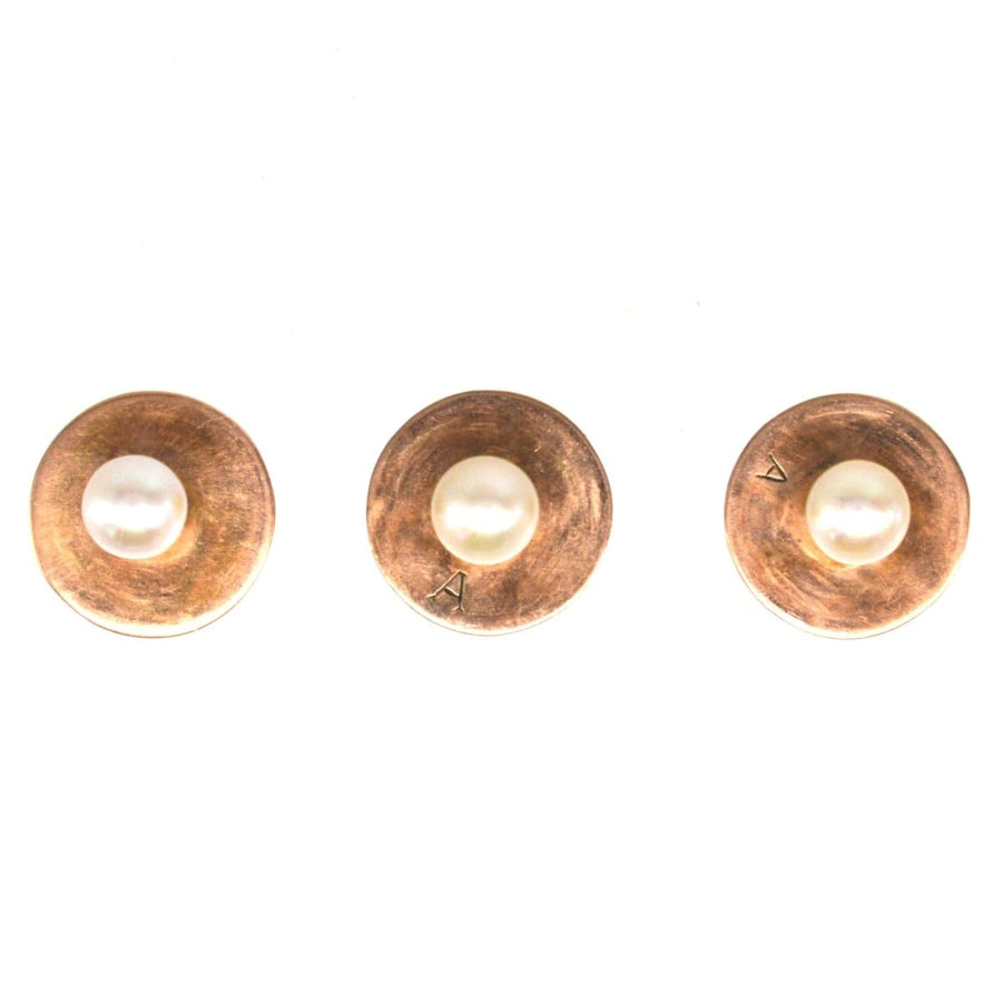 Trio of Edwardian 9ct gold dress studs featuring natural pearls in a stunning pearly white finish.