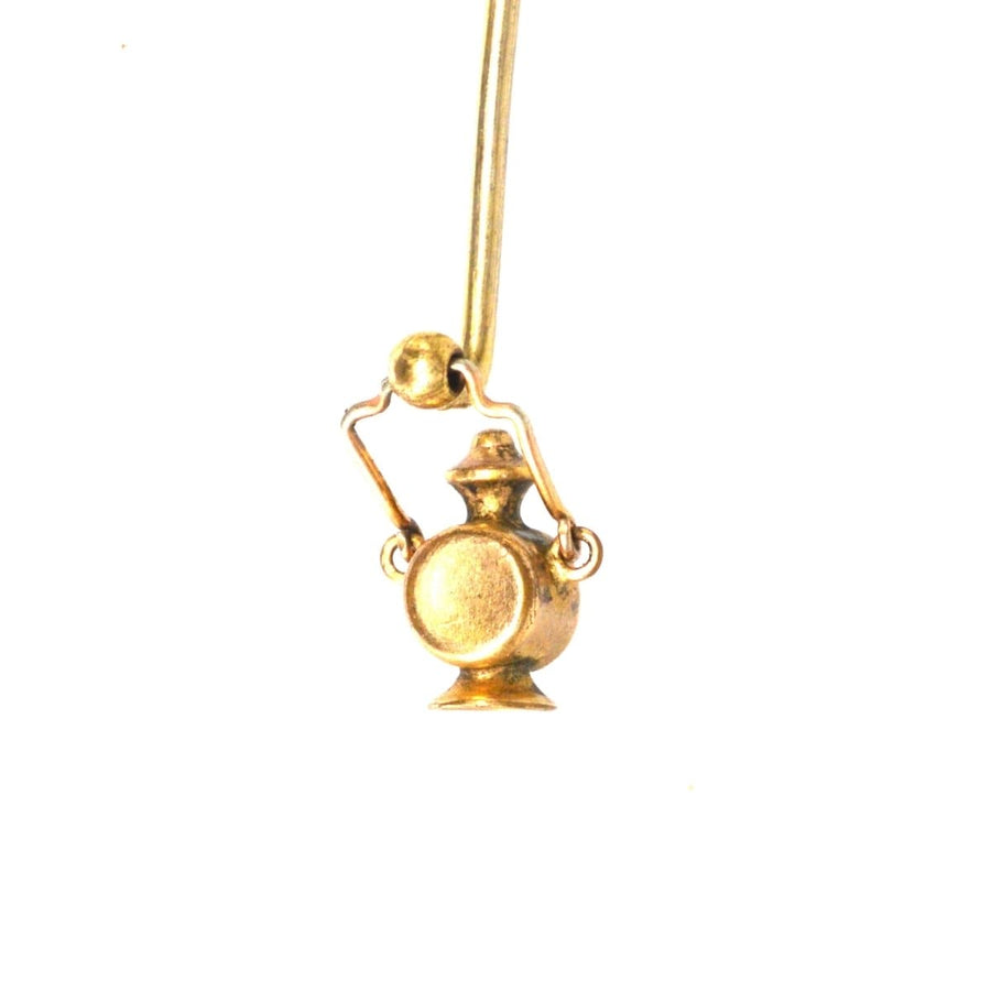 Edwardian 9ct gold tie pin featuring an old railway signal lamp design, with classic green light detail.