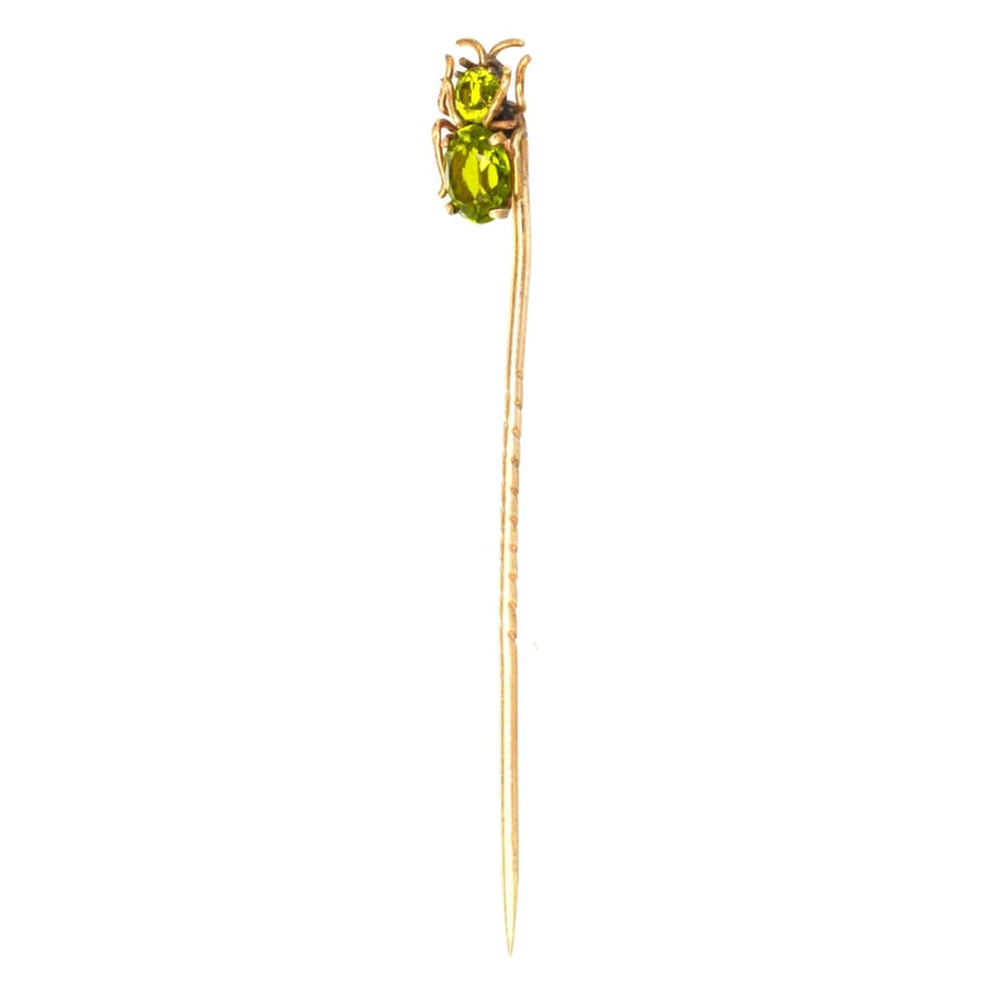 Edwardian gold bug tie pin with peridot gemstones, perfect for August birthdays and colorful silk ties.