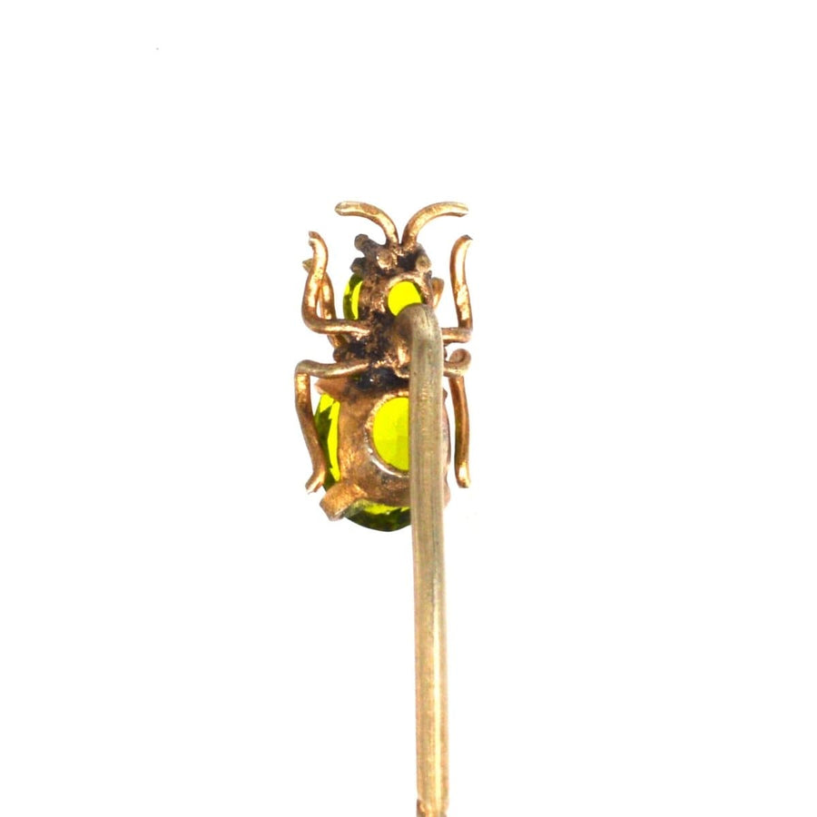 Edwardian 9ct gold bug tie pin adorned with peridot, ideal accessory for stylish silk ties.