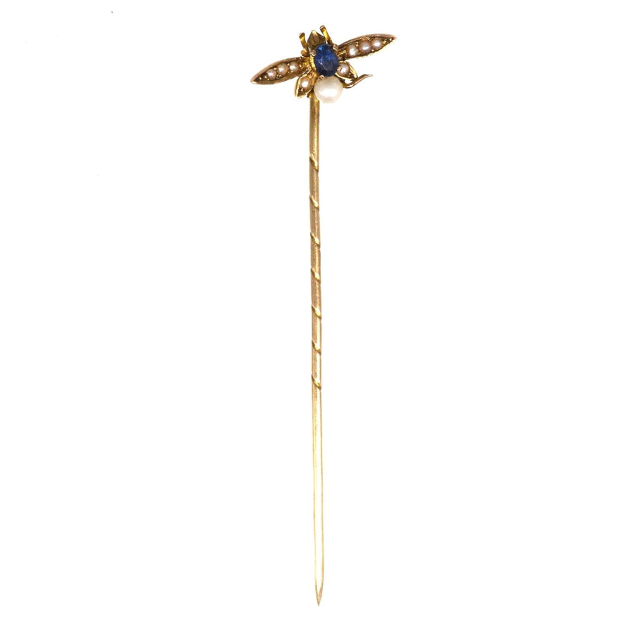 Edwardian 9ct gold bee tie pin featuring sapphire and natural pearl, ideal for ties and lapels.