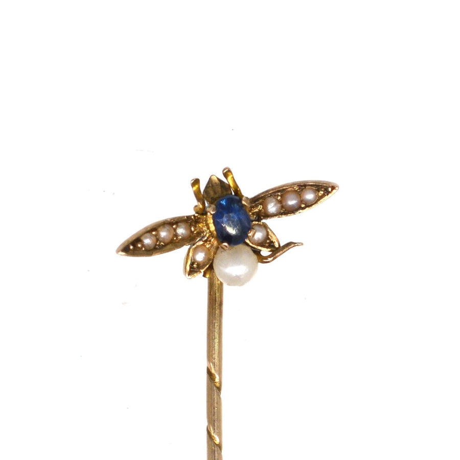 Edwardian 9ct gold bee tie pin with sapphire and natural pearl, elegant for ties or lapels.