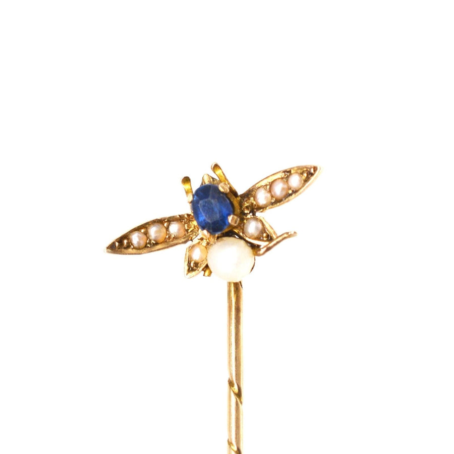Edwardian 9ct gold bee tie pin featuring sapphire and natural pearl details, perfect for silk ties and lapels.