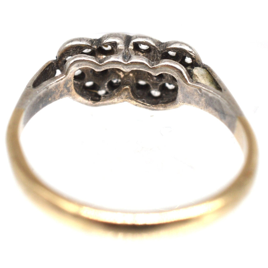 Edwardian 9ct gold and silver double heart ring with paste stones, showcasing timeless elegance and sentimental design.