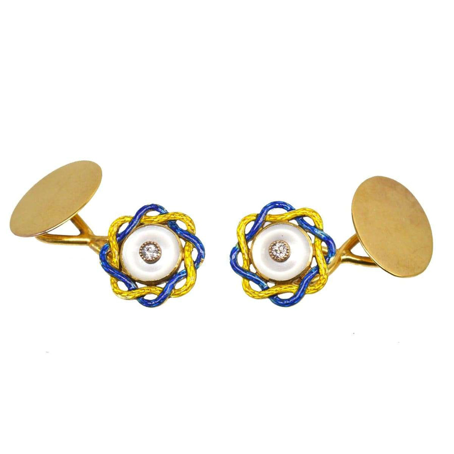 Edwardian mother of pearl and diamond cufflinks with blue and yellow enamel design, perfect for formal occasions.