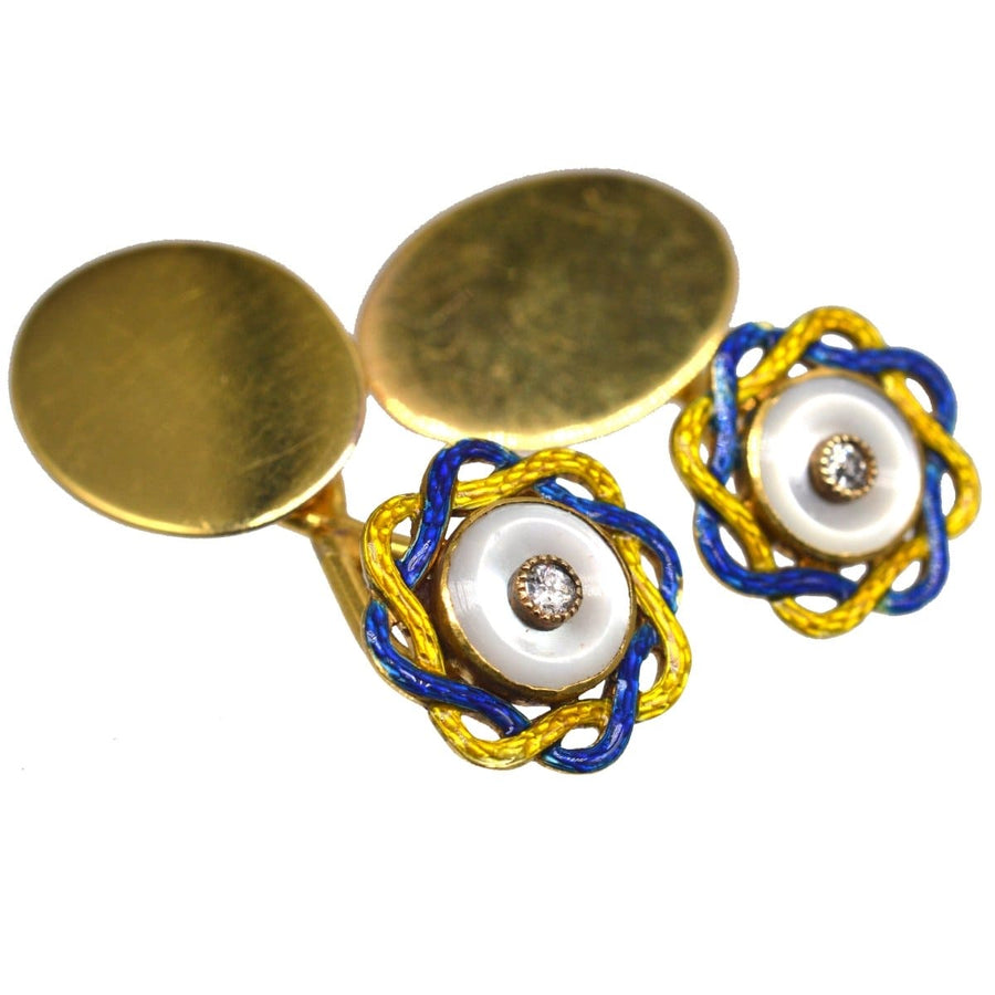 Antique Edwardian cufflinks featuring mother of pearl, diamond, and blue and yellow enamel detailing.