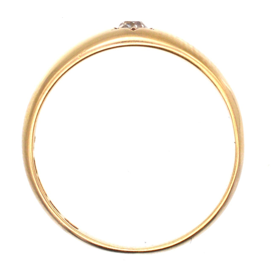 Edwardian 18ct gold gypsy ring featuring a central old mine cut diamond in star shape setting.