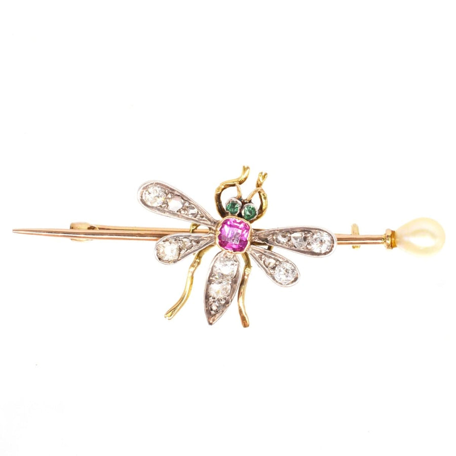 Edwardian bug brooch in platinum and gold with pink sapphire, emerald eyes, diamond wings, and natural pearl.