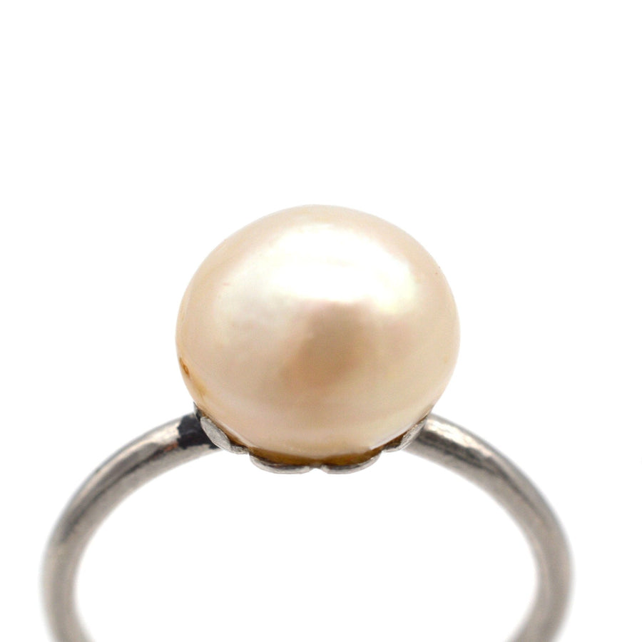 Edwardian platinum ring featuring a lustrous natural saltwater pearl, circa 1910, certified and untreated.