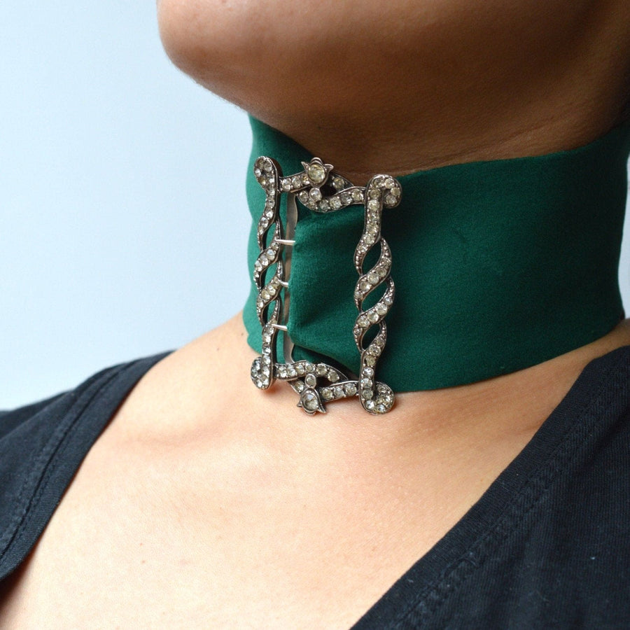 Edwardian silver and paste buckle featured on a green velvet choker, showcasing vintage elegance and versatility.