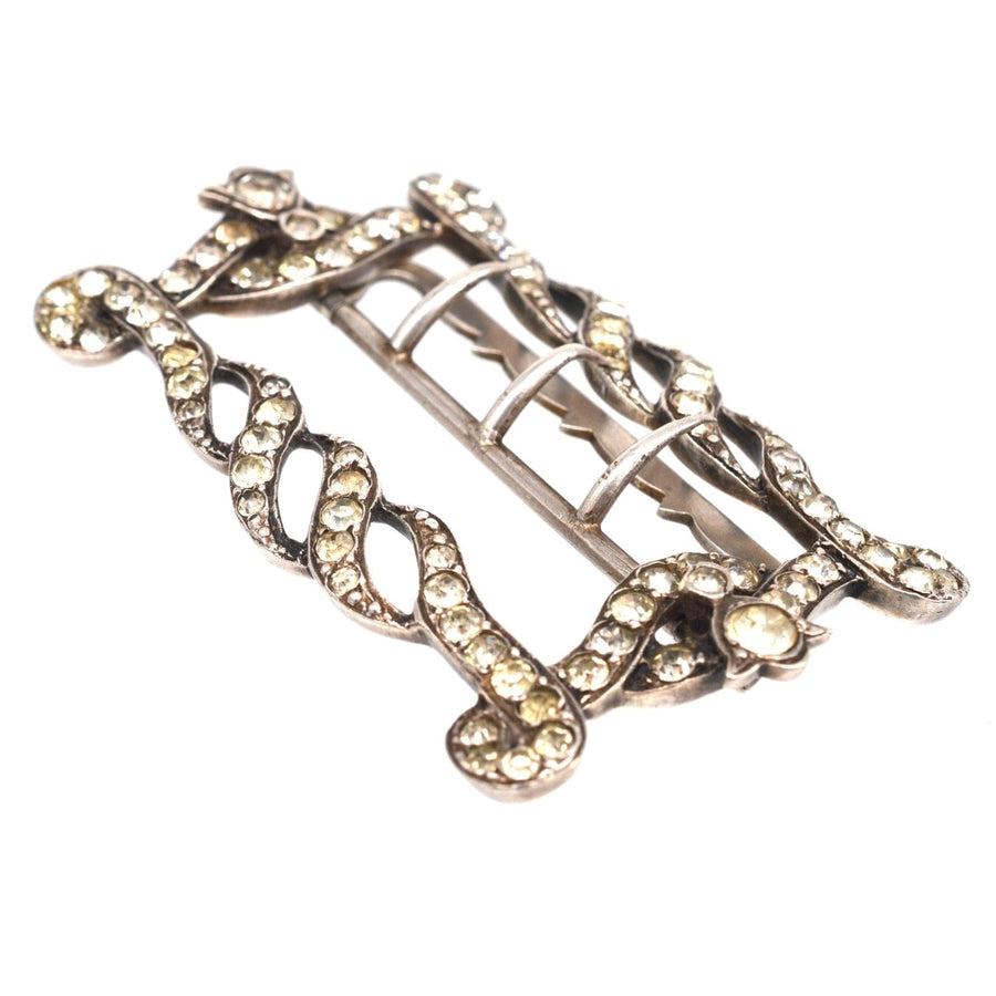 Edwardian silver and paste buckle with intricate design and sparkling details, perfect for choker or belt embellishment.