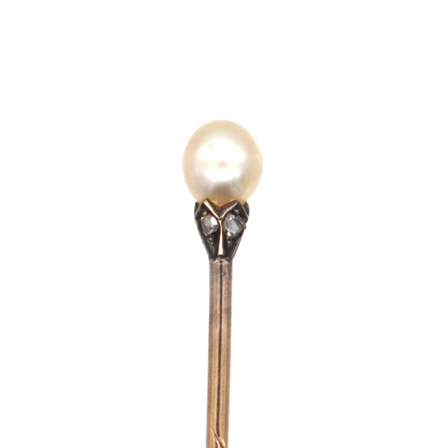 Edwardian silver tie pin featuring a natural pearl and diamond accents, ideal for a stylish silk tie.