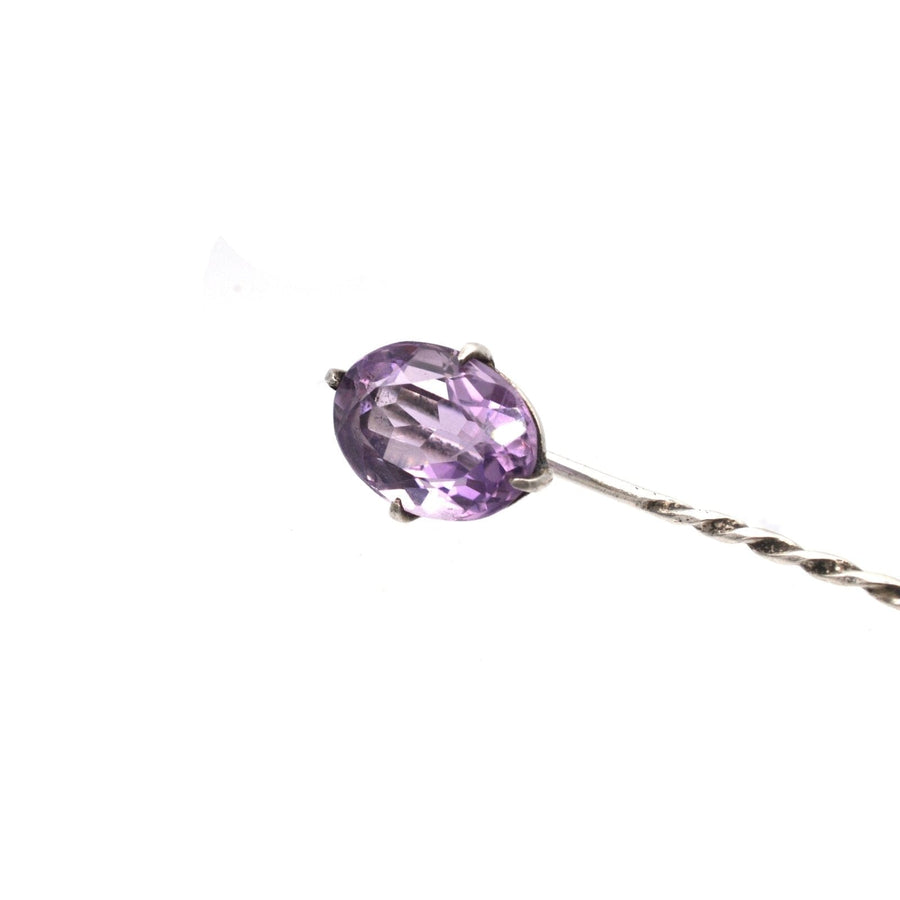 Elegant Edwardian silver tie pin featuring a natural oval amethyst gemstone.