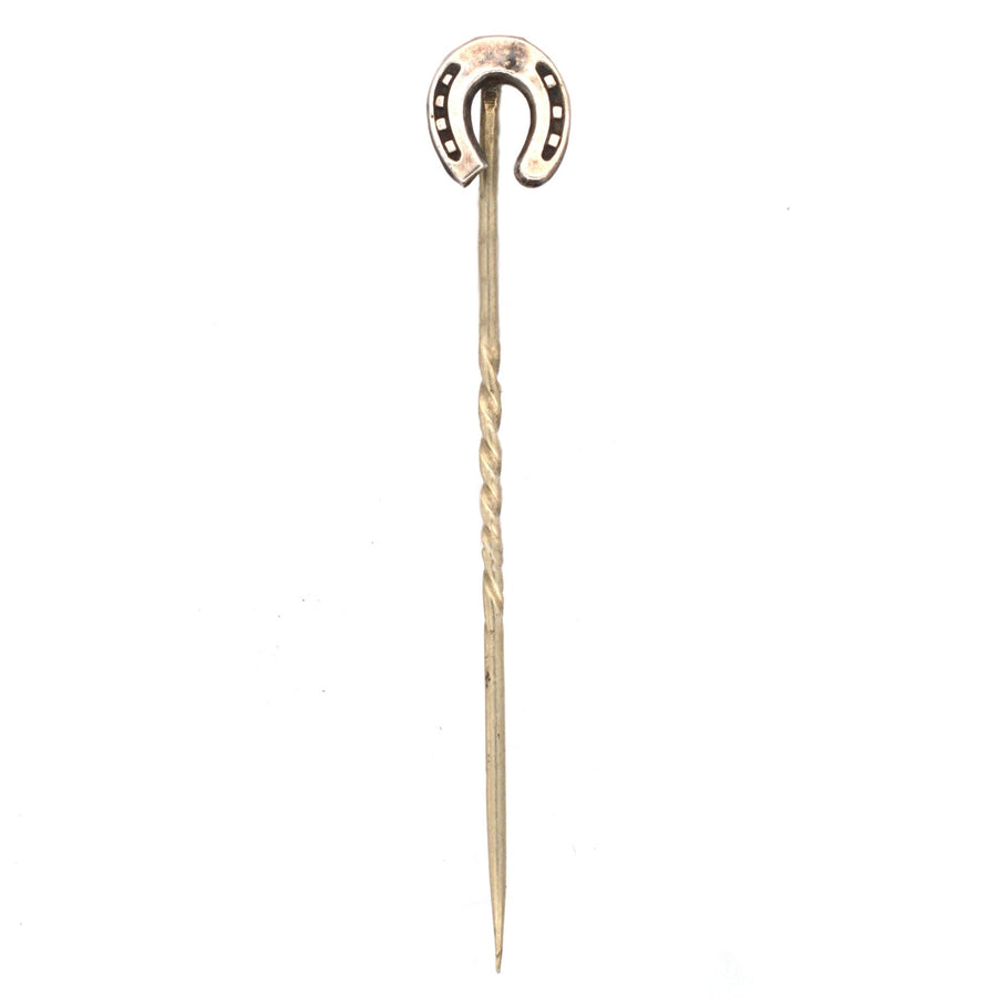 Edwardian silver lucky horseshoe tie pin from the 1900s, symbolizing good luck and protection.