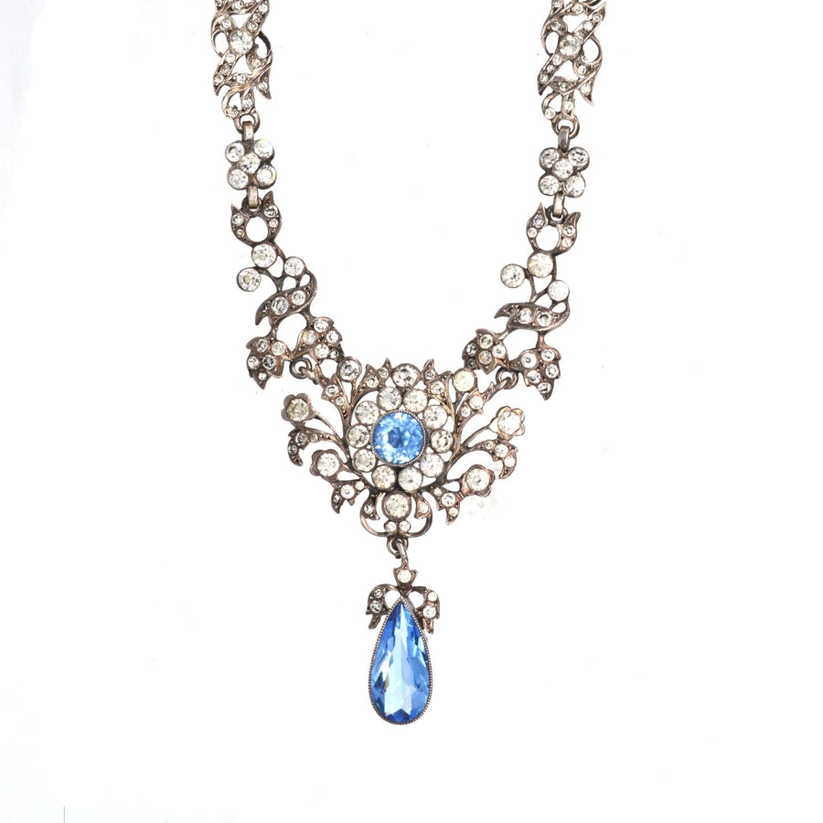 Edwardian silver necklace featuring aquamarine paste and diamond cluster centerpiece, perfect for weddings and elegant parties.