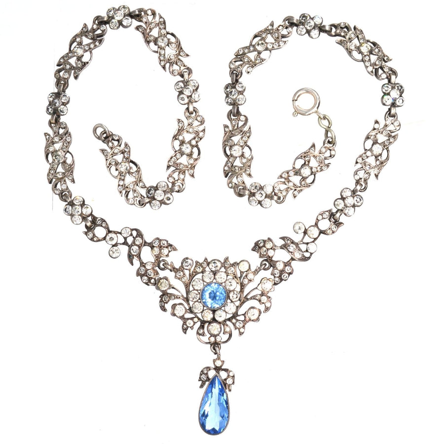 Elegant Edwardian silver necklace with aquamarine paste and diamond cluster centerpiece, perfect for weddings or evening parties.