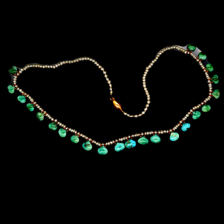 Edwardian turquoise and seed pearl necklace showcasing unique scallop-shaped turquoise and perfectly matched seed pearls.