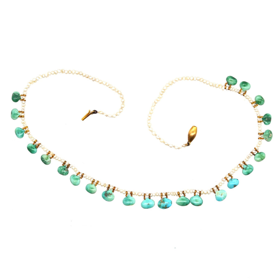 Edwardian turquoise and seed pearl necklace showcasing scallop-shaped turquoise and matched seed pearls.