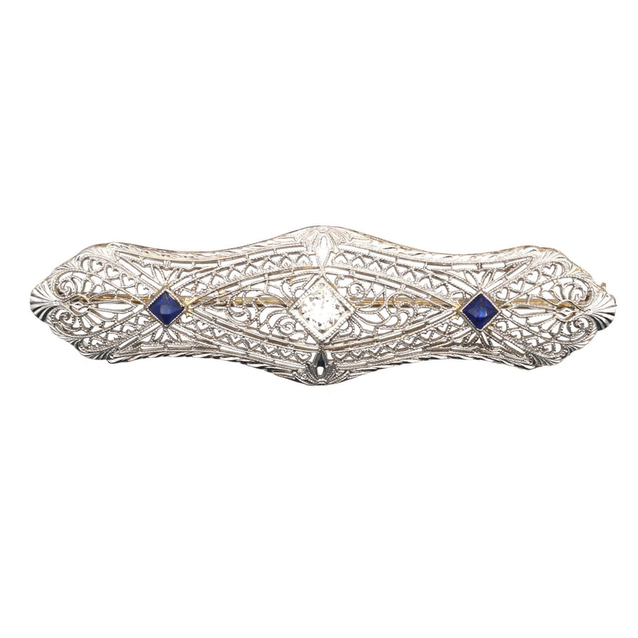 French Art Deco 14ct gold sapphire and diamond bar brooch with intricate white gold design