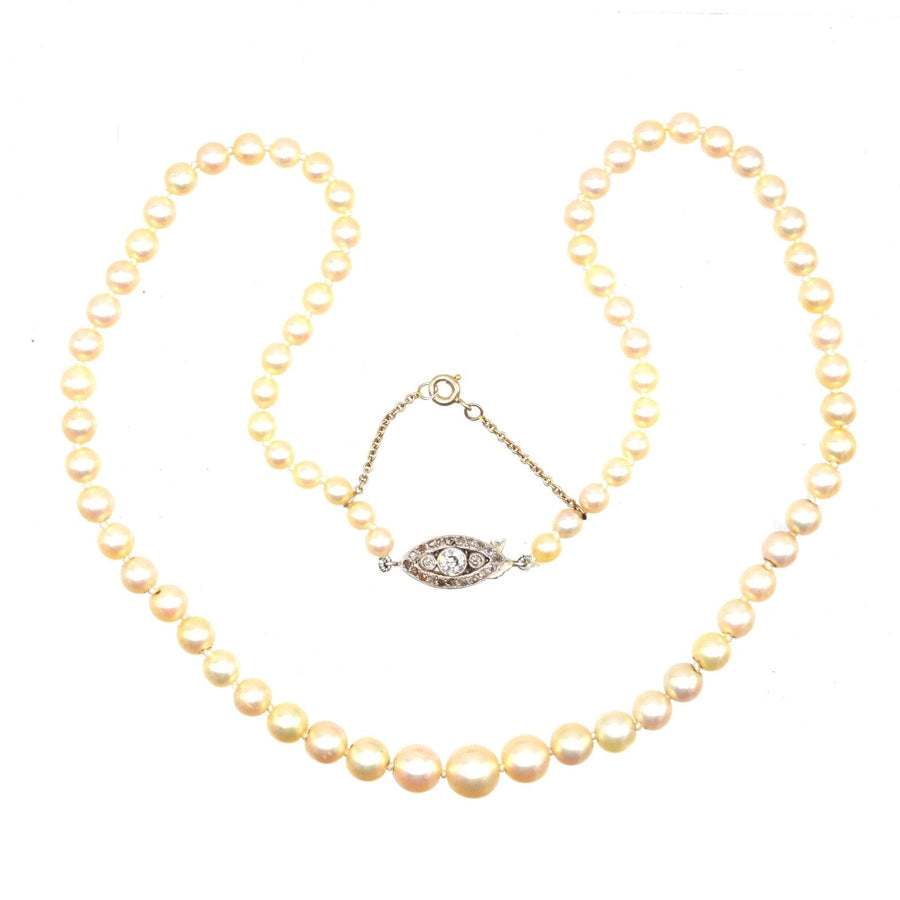 French Belle Epoque 18ct white gold cultured pearl necklace with diamond clasp, classic and timeless jewelry.