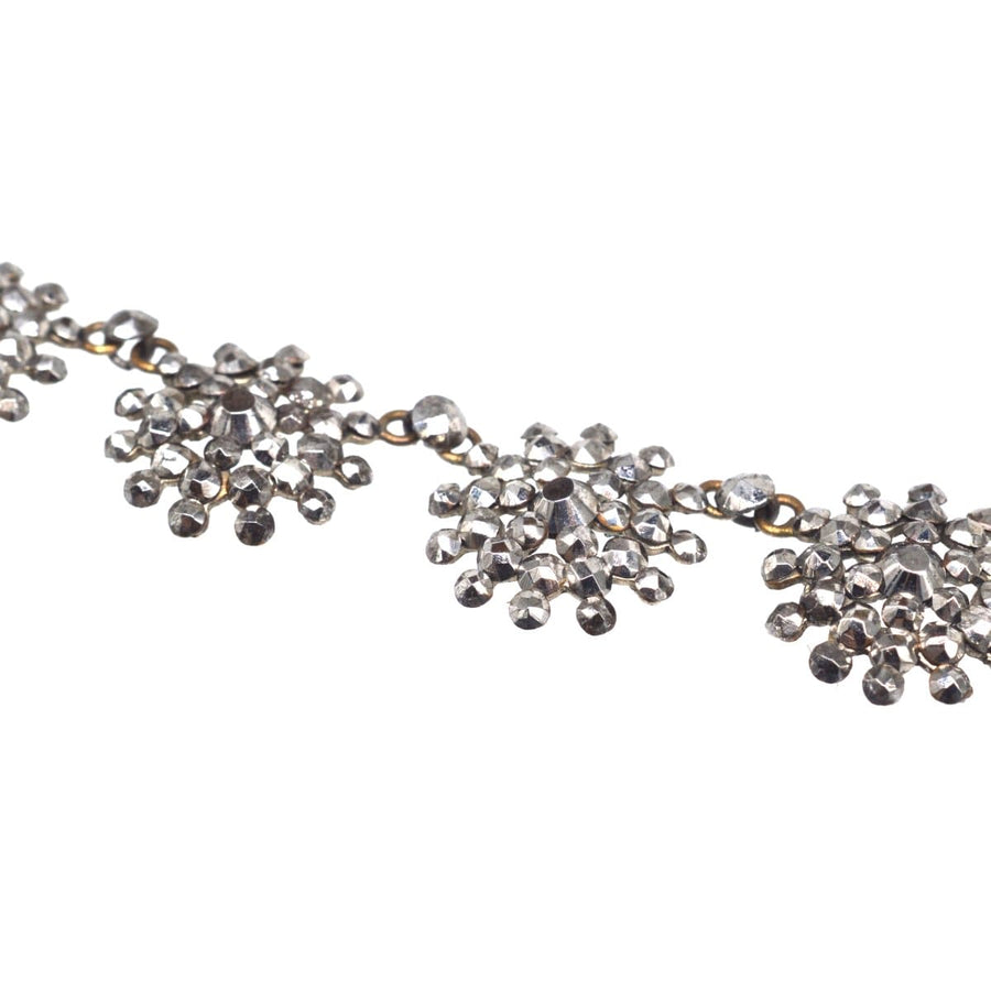 Georgian 19th century cut steel necklace featuring intricate floral designs and sparkling cut steel accents.