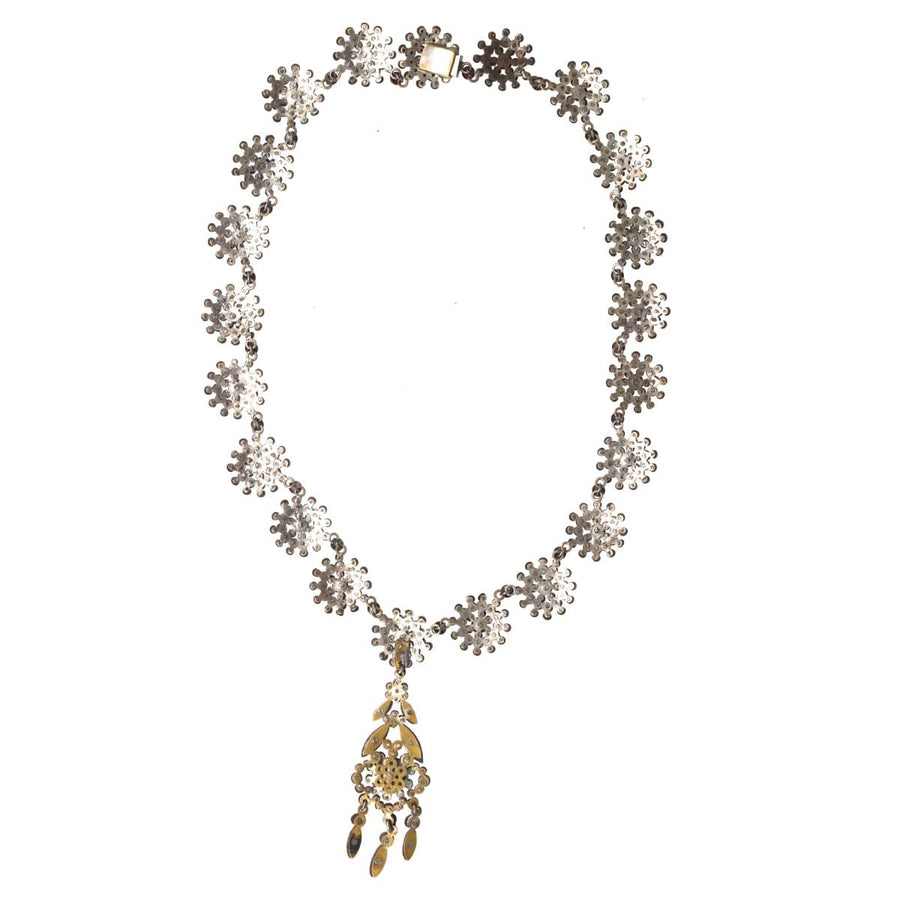 Georgian 19th Century cut steel necklace with intricate floral design and gold accents, circa 1820s.