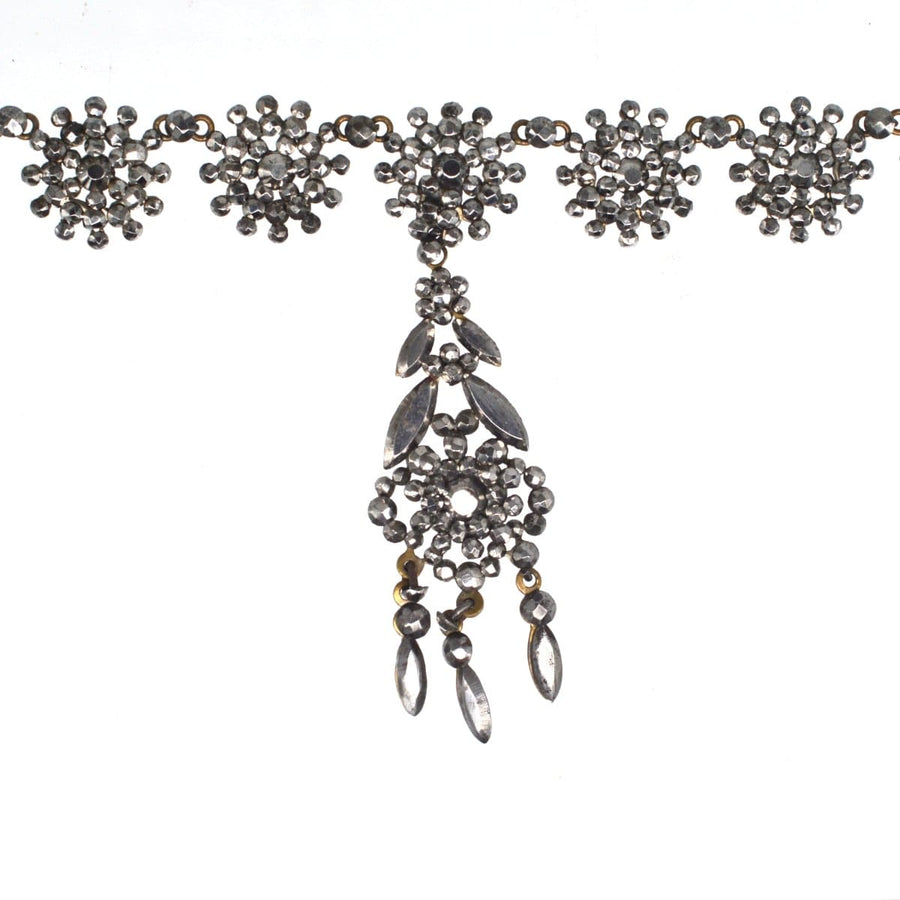 Georgian 19th century cut steel necklace featuring intricate floral designs and sparkling cut steel embellishments.