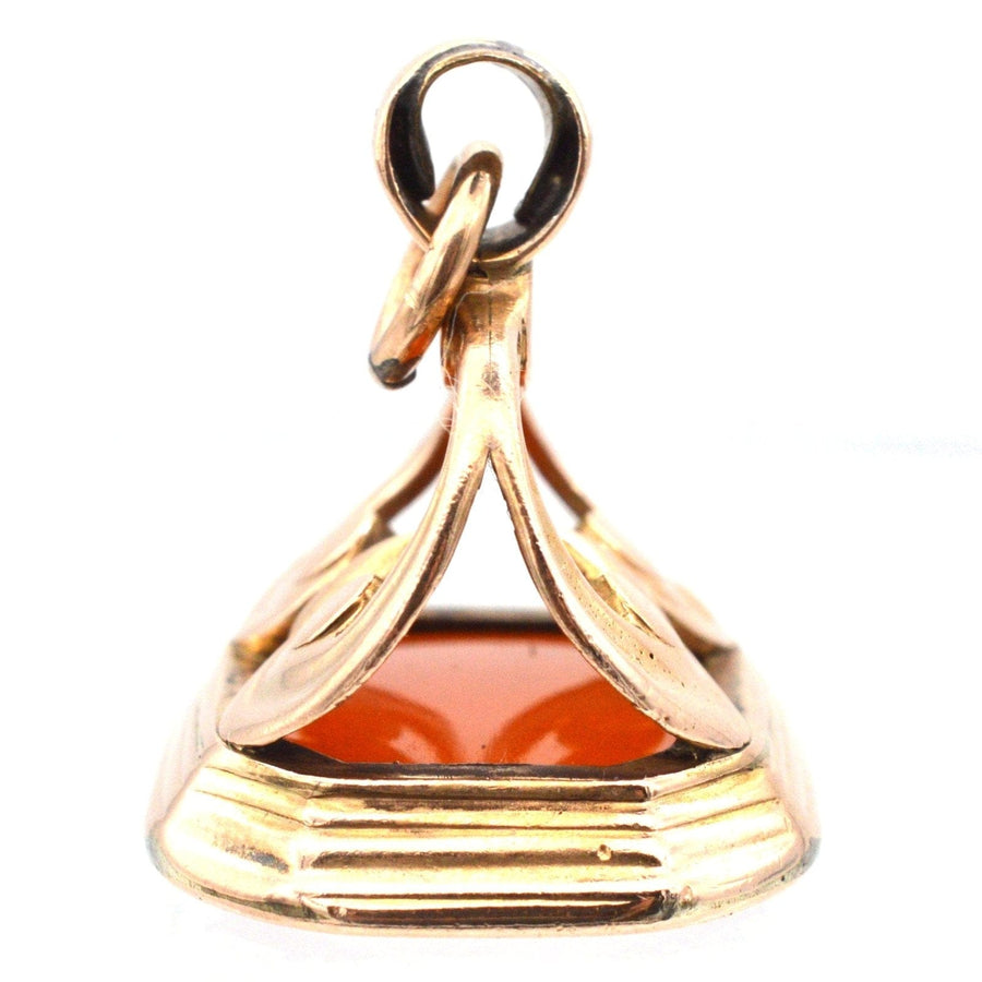 Georgian 9ct gold seal with a vibrant orange stone, showcasing intricate design details from the 1750s.