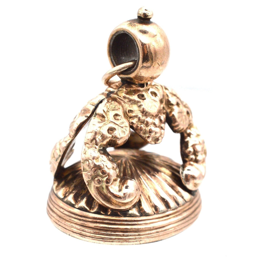 Georgian 9ct gold armorial seal featuring decorative design, part of Lee family crest with three crescent moons.