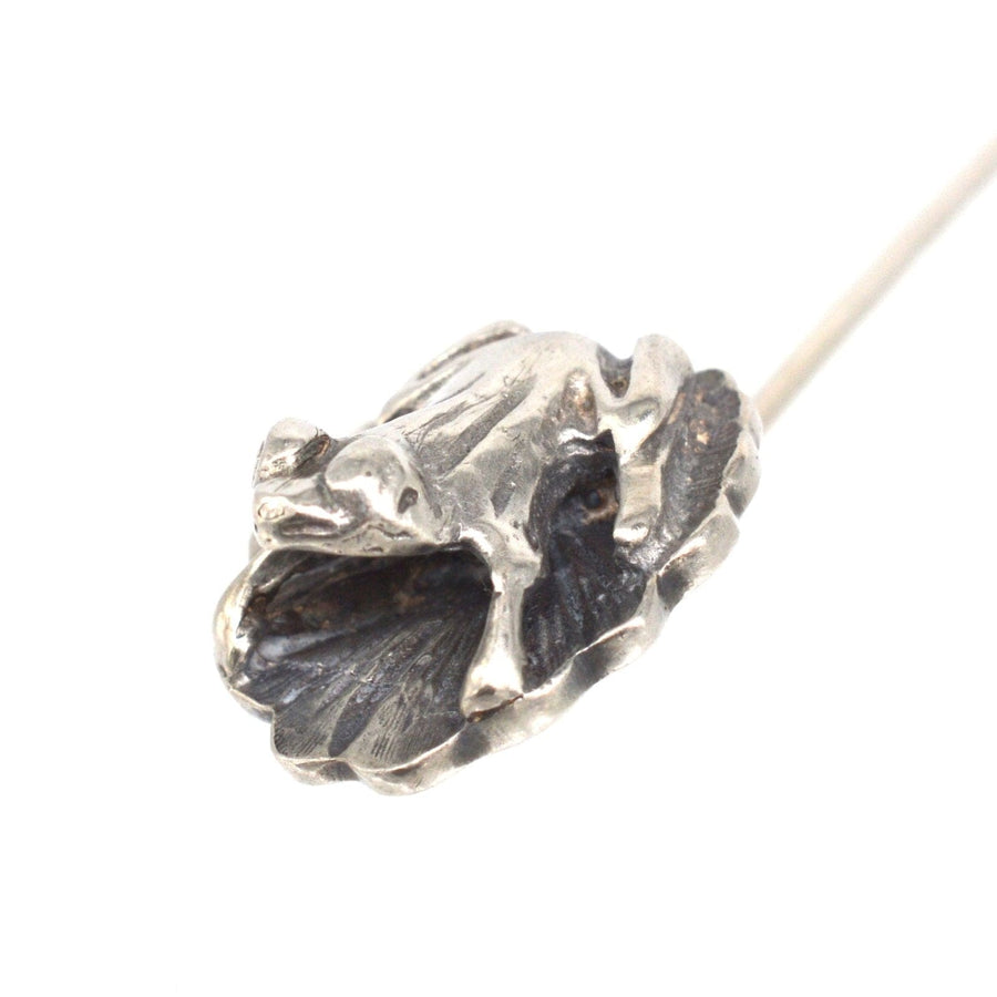 Vintage 1940s silver frog tie pin on lily pad, perfect accessory for elegant occasions.
