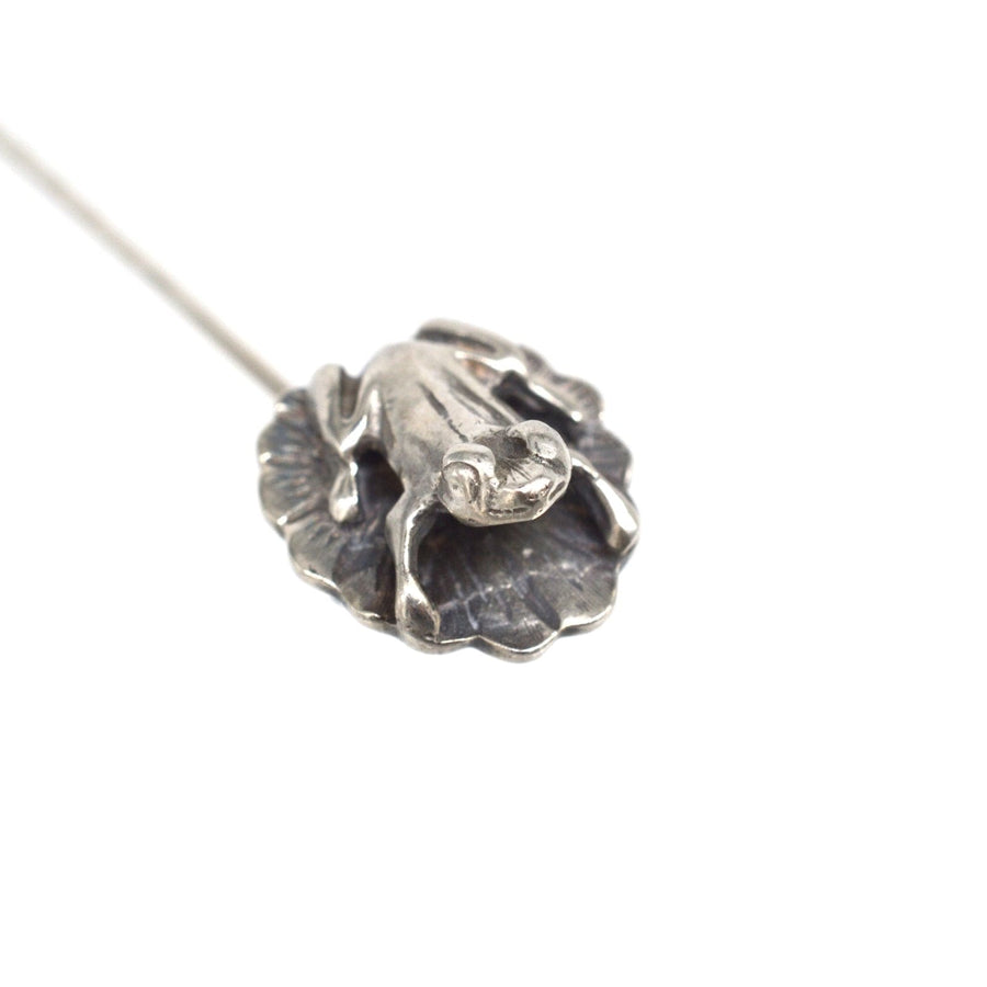 Vintage 1940s silver frog tie pin on lily pad, perfect for sophisticated occasions and stylish accessories.