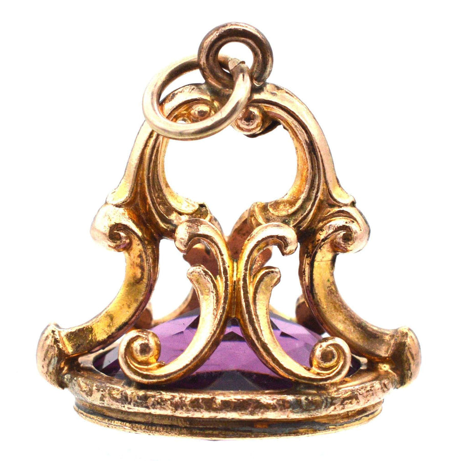 Georgian 9ct gold seal pendant featuring a large purple amethyst, ornate design from the William IV era.
