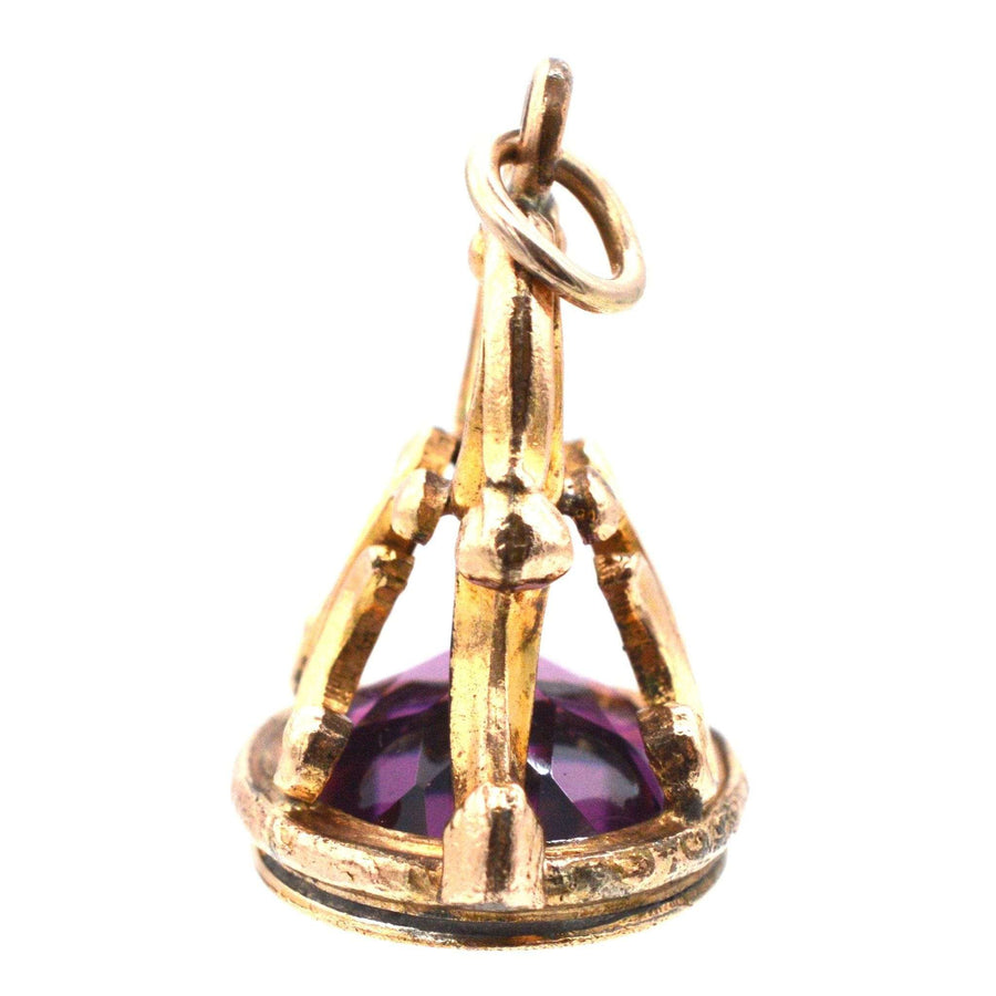Georgian 9ct gold seal pendant featuring a large purple amethyst gemstone, luxurious and elegant jewelry.