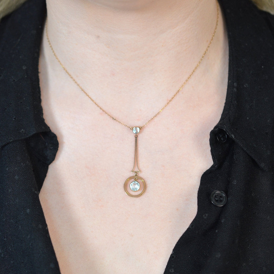 Art Deco 9ct gold pendant with aquamarine, inspired by Eiffel Tower design, perfect for jewelry collection.