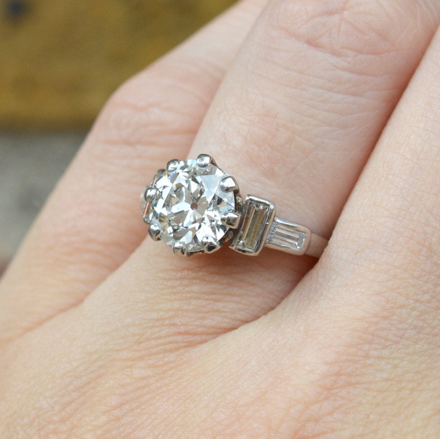 Large Art Deco Platinum 3 Carat Old European Cut Diamond Solitaire Ring with Baguette Diamond Shoulders | Parkin and Gerrish | Antique & Vintage Jewellery
