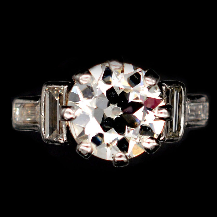 Large Art Deco Platinum 3 Carat Old European Cut Diamond Solitaire Ring with Baguette Diamond Shoulders | Parkin and Gerrish | Antique & Vintage Jewellery