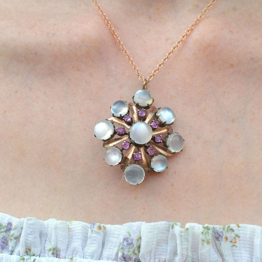 Large silver and gold brooch pendant featuring moonstone and natural ruby stones, stunning vintage design from 1910.