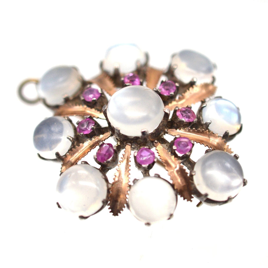 Large antique silver and gold brooch pendant with moonstones and natural rubies, dating back to 1910.