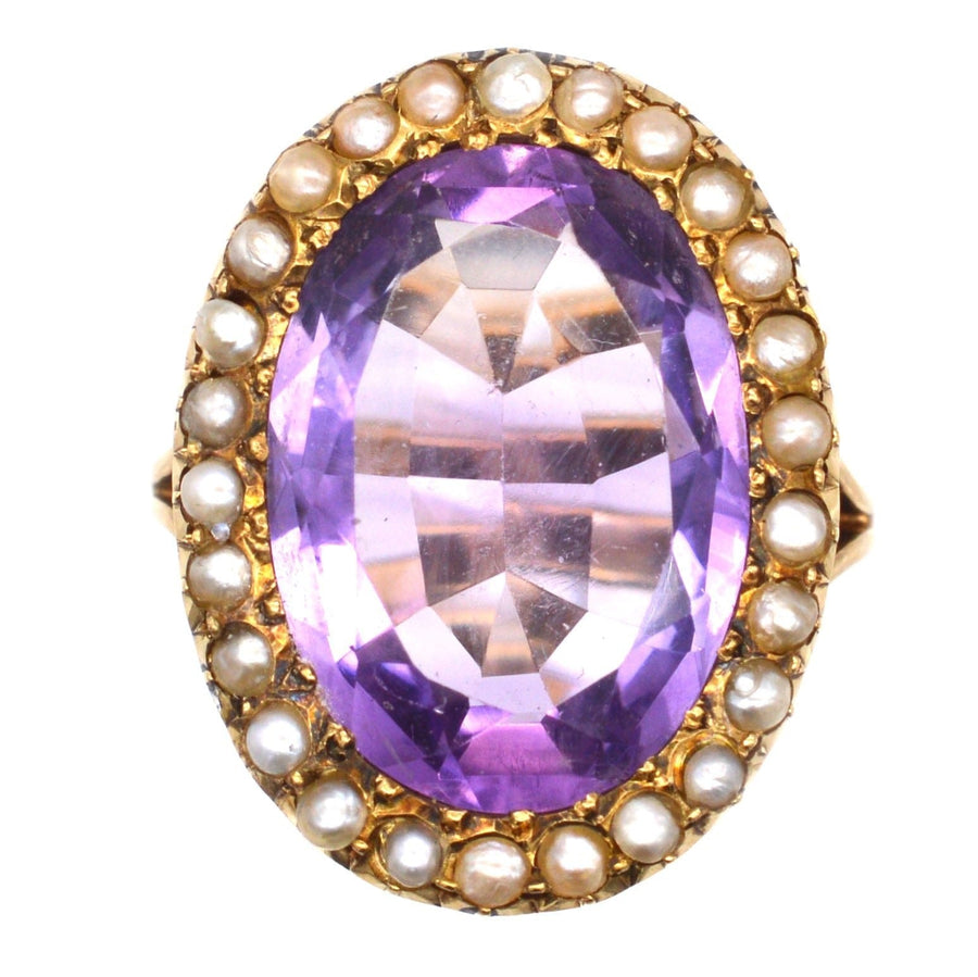 Large Edwardian 15ct gold ring featuring a statement amethyst surrounded by natural split pearls.