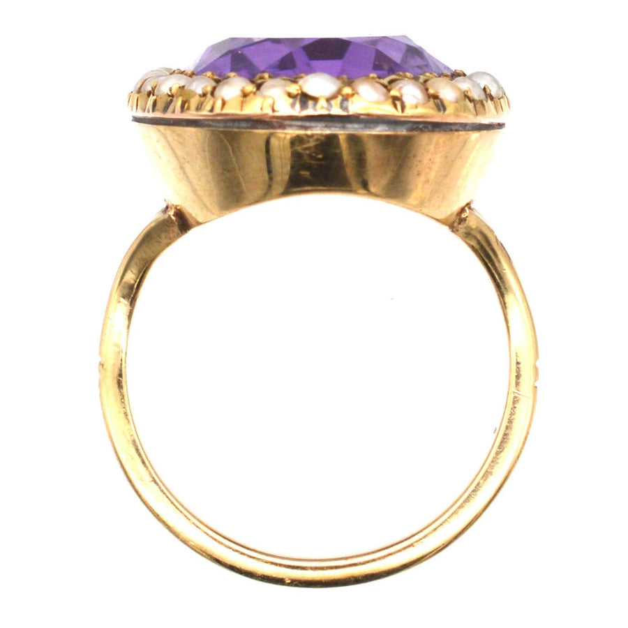 Large Edwardian 15ct gold ring featuring a stunning amethyst and natural split pearl setting.