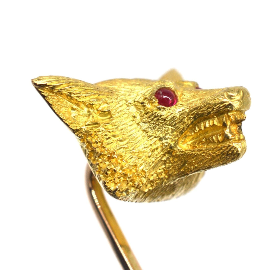 Large Edwardian 18ct gold fox tie pin with ruby eyes, detailed craftsmanship perfect for silk ties or lapels.