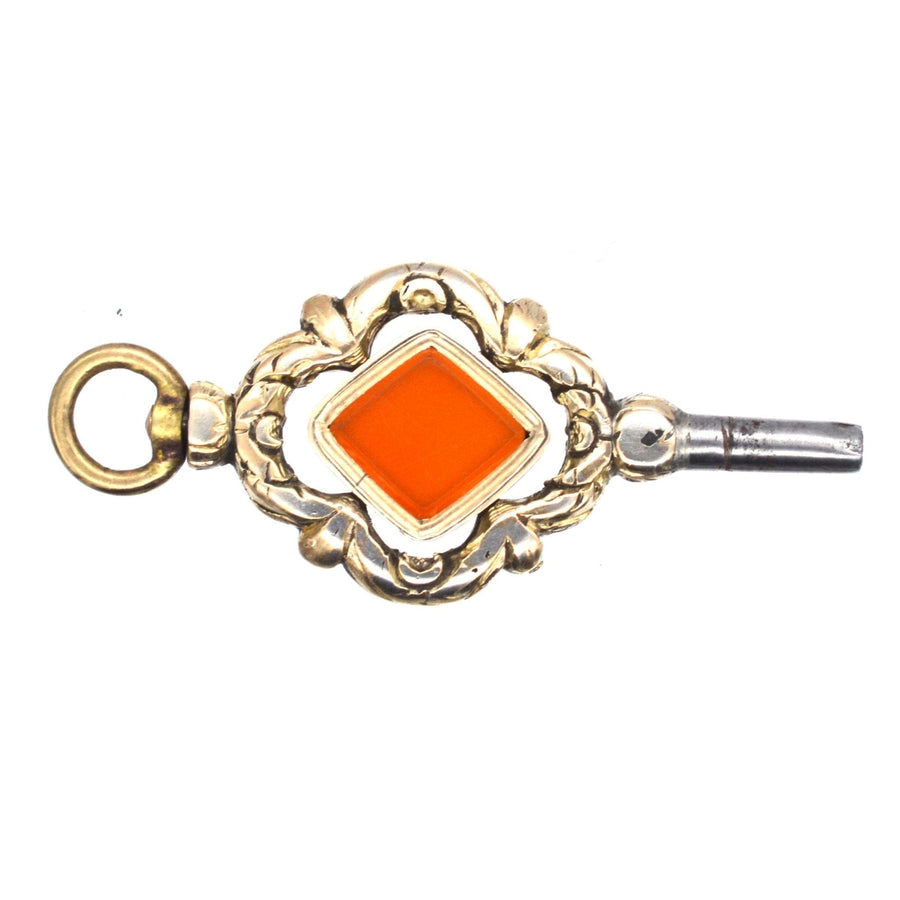 Large Regency gold watch key featuring diamond-shaped carnelian, circa 1820s-1830s, elegant pendant design.