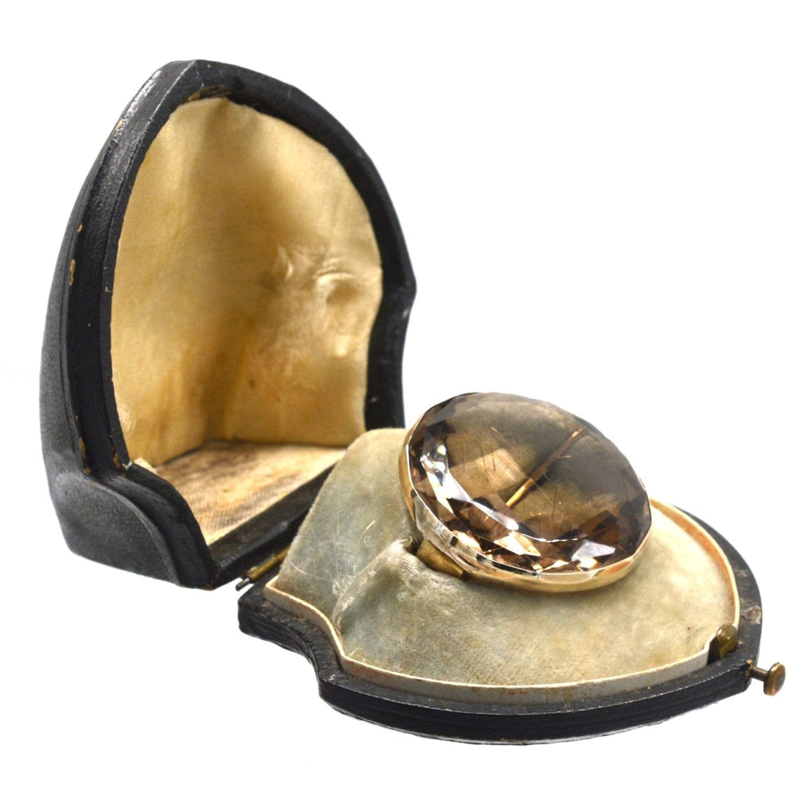 Large Victorian silver brooch with rutilated quartz in original black case.