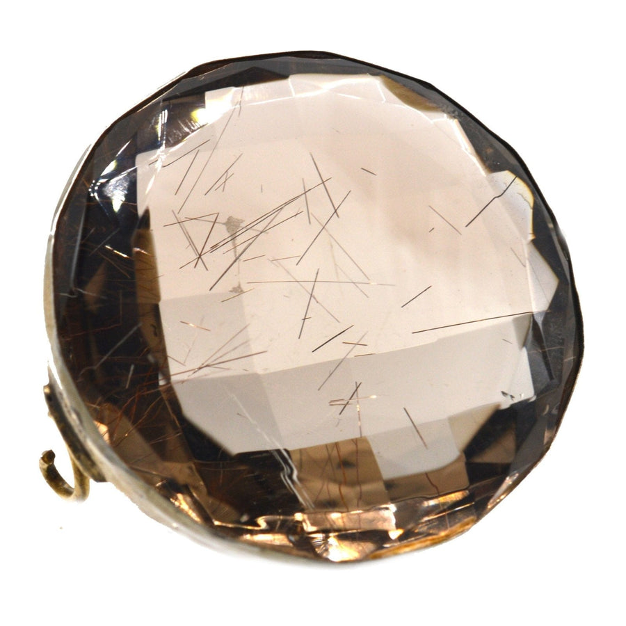 Large Victorian silver brooch featuring rutilated quartz with distinct hair-like inclusions in original case.