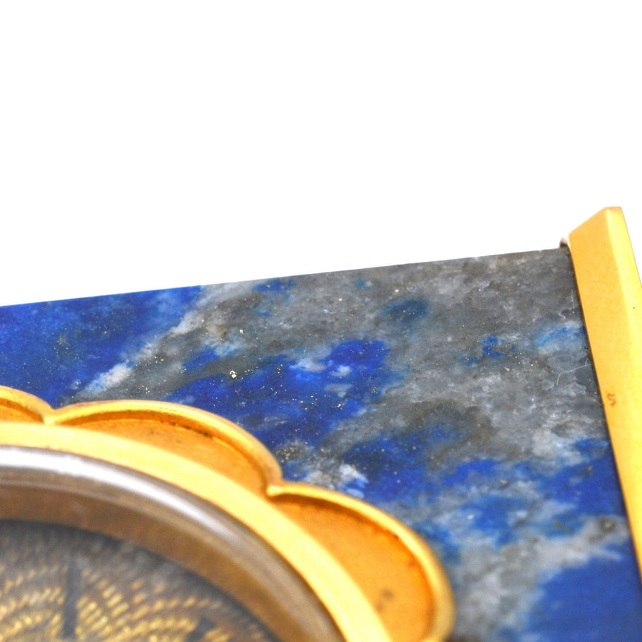 Close-up of late 1960s French mantlepiece clock with lapis lazuli and gold detailing by de Brysal.
