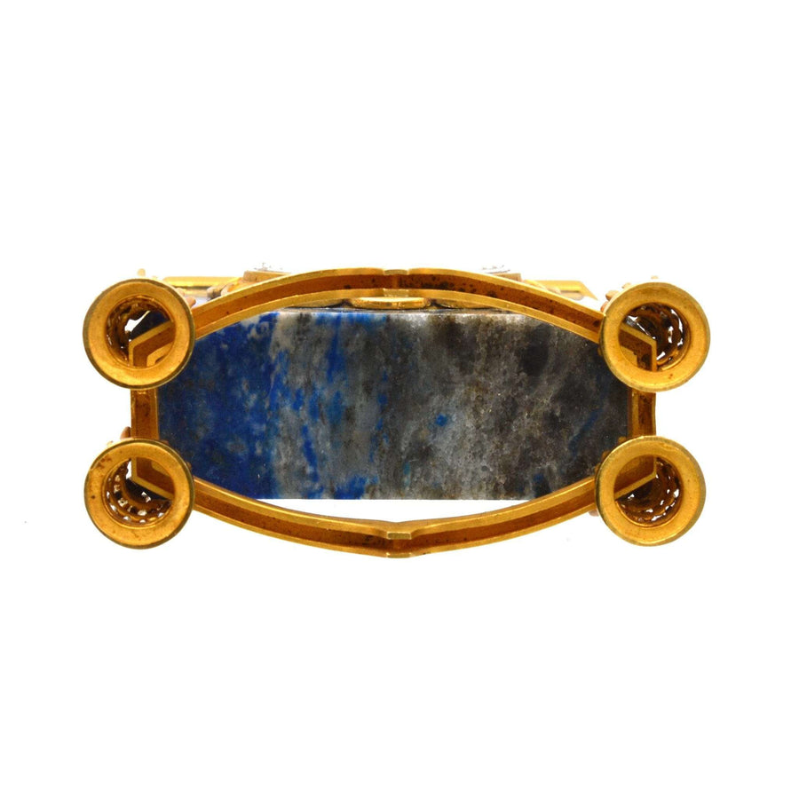 Close-up of the de Brysal 18ct gold lapis lazuli clock base showcasing intricate craftsmanship and design.