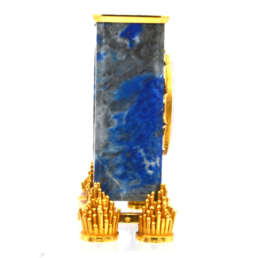 Late 1960s French 18ct gold lapis lazuli clock by de Brysal, featuring ornate gold details.