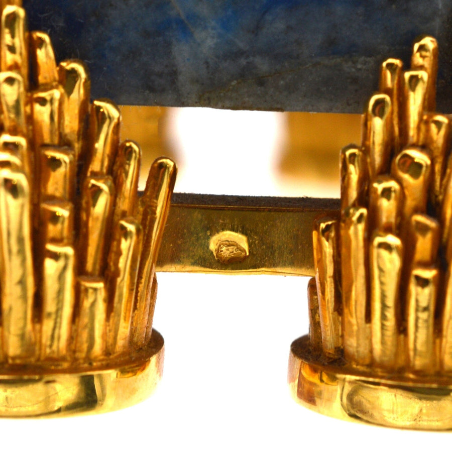 Detail of late 1960s French clock case featuring golden accents and lapis lazuli from de Brysal clock.